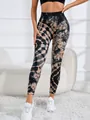 Detailed view of high-waisted tie-dye yoga leggings for fitness and running - S / Bottoms / Black