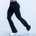 High-waisted black seamless yoga flare pants for athletic workout and daily fitness - XS / Bottoms / Black