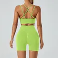 Back view of seamless lime green yoga set with cross-back sports bra and high-waist shorts - M / Top And Bottom / Green