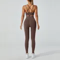 Two-piece coffee brown yoga set with cross-back sports bra and high-waist leggings - Coffee