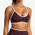 High-performance seamless leopard print sports bra in dark purple with contrast piping detail - XS / Tops / Wine Red Leopard