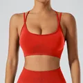 Vibrant red seamless sports bra with thin double straps and supportive ribbed band - S / Tops / Red