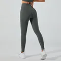 Leggings da yoga senza cuciture a vita alta con effetto lifting glutei in grigio - Taglia M / Pantaloni e gonne / Grigio scuro