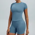 Seamless yoga set in muted blue with slim fit short sleeve top and high waist shorts - XS / Top And Bottom / Shorts Set / Misty Blue
