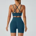 Professioneel achteraanzicht van de naadloze sport-bh en yoga-shorts set groenblauw - Donkergroen