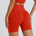 High waisted red seamless yoga shorts featuring a scrunch butt lifting design for fitness - S / Bottoms / Red