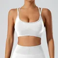 Elegant white seamless sports bra with a ribbed underband and dual straps for yoga fitness - S / Tops / White