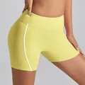 High-waisted pale yellow yoga shorts with white contrast side stitching for women. - S / Bottoms / Goose Yellow