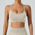 Beige criss-cross back sports bra and yoga leggings set for fitness and gym workout wear. - S / Tops / Khaki