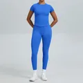 Sportieve naadloze blauwe yogaset met top met korte mouwen en bijpassende high-waist legging - XS / Boven- En Onderstuk / Broek Set / Elektrisch Blauw