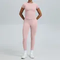 Professioneel naadloos roze yogaset met top met korte mouwen en nauwsluitende hoge legging - XS / Boven- En Onderstuk / Broek Set / Roze