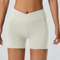 Short de yoga taille haute avec taille en V croisée et poches latérales blanc crème - S / Bas / Short / Blanc Mélange