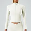 Veste de sport blanc cassé ajustée pour femme avec fermeture éclair et col montant. - L / Haut Et Bas / Ensemble à Manches Longues / Blanc Mélange
