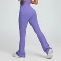 High-waisted purple flare yoga pants featuring a slim fit butt-lifting design for fitness - S / Bottoms / Purple