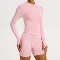 Pink two-piece seamless yoga set with long sleeve zipper top and ribbed shorts - Peach Pink