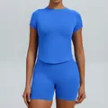 Tweeledige naadloze yogaset in blauw met top met korte mouwen en strakke wielrenbroek - XS / Boven- En Onderstuk / Short Set / Elektrisch Blauw