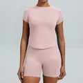 Naadloze roze yogaset voor dames met top met korte mouwen en sportieve korte broek - XS / Boven- En Onderstuk / Short Set / Roze