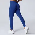 Cobalt blue high-waisted seamless yoga leggings featuring a peach butt lift design - XS / Bottoms / Deep Sea Blue