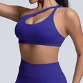 High-performance seamless matte nylon one-shoulder sports bra in dark blue color - Indigo Blue