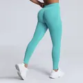 High-waisted seamless fitness leggings in mint green with a peach butt-lifting effect for women - Mint Green