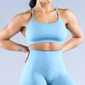 Detailed macro view of light blue seamless matte nylon yoga sports bra texture - Light Blue