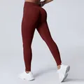 Seamless matte high-waisted peach butt-lifting yoga leggings in deep red - Burgundy