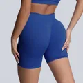 High-waisted seamless matte yoga shorts in cobalt blue featuring butt-lifting design - Deep Sea Blue