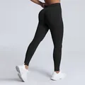 High waisted seamless matte black sports leggings with peach butt lift design for fitness - XS / Bottoms / Carbon Black
