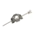 Macro view of a vintage silver alloy hair stick featuring detailed moon and cloud motifs. - Silver