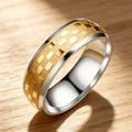6mm titanium steel band ring with elegant gold checkered pattern on wood surface - US 7 / Gold
