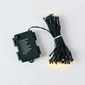 Warm white LED Christmas string lights with 8-mode battery control box - 5m 50-LED Battery Box Light String (Timer/Waterproof/Dark Green Wire)