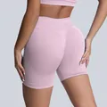 High-waisted seamless pink yoga shorts with butt-lifting contour design for fitness workout - XS / Bottoms / Pink