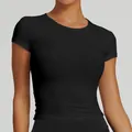 T-shirt da yoga nera traspirante e attillata per fitness, palestra e corsa sportiva - Taglia S / Top / Nero