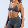 Detailed view of the charcoal grey seamless yoga sports bra and high-waisted leggings set - Shark Grey
