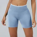 Blue seamless high-waist yoga shorts with a white contrast waistband for fitness - XS / Bottoms / Baby Blue