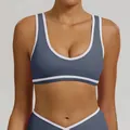 Blue sports bra with white contrast trim and wide shoulder straps for yoga and fitness - S / Tops / Blue Gray