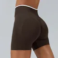 High-waist seamless peach-lift yoga shorts in dark brown featuring a white waistband trim - Coffee