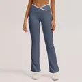 High-waisted flared yoga pants featuring a stylish crossover waistband in a muted blue color - S / Bottoms / Blue Gray