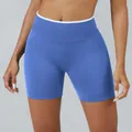 Seamless blue yoga shorts featuring a white contrast waistband and scrunch butt. - Provence Blue