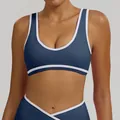 Marineblauer Sport-BH mit weißem Kontrastrand und breiten Trägern für Yoga-Training - Marineblau