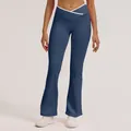 Stylish high-waisted crossover flare yoga pants for women in a premium navy blue finish - Navy Blue