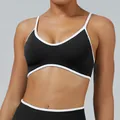 Black sports bra with white contrast trim for professional yoga and fitness training wear - XS / Tops / Black
