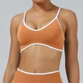 Burnt orange seamless sports bra with white contrast trim for women yoga and fitness - XS / Tops / Pumpkin Orange