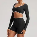 Black seamless long-sleeve yoga top with white contrast trim and fake two-piece design - XS / Top And Bottom / Black