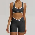 Two-piece yoga set featuring charcoal grey sports bra and white trim cross high-waist shorts - S / Top And Bottom / Black