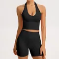 Seamless black yoga set featuring a ribbed halter neck top and high-waisted shorts. - S / Top And Bottom / Black