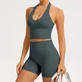 Grey seamless yoga set for women featuring ribbed high waist shorts and halter back top - S / Top And Bottom / Dark Gray