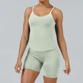 Two-piece sage green athletic yoga set with white contrast trim and slim fit shorts - XS / Top And Bottom / Pistachio Green (Vest + Shorts)