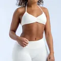 Witte naadloze yogaset met halter sport-bh en legging met hoge taille voor fitness - XS / Boven- En Onderstuk / Wit