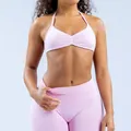 Lichtroze naadloze yogaset met halter sportbeha en legging met hoge taille. - XS / Boven- En Onderstuk / Roze